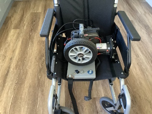 Wheelchair and motor