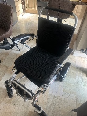 Freedom folding powered wheelchair 