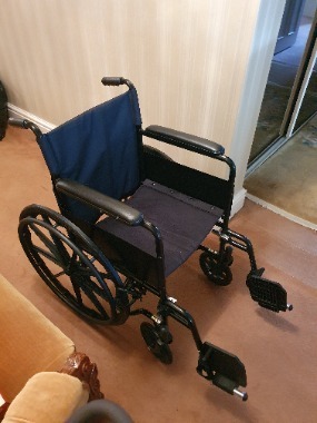 Self-propelled wheelchair.