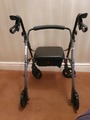 4 wheeled walker image