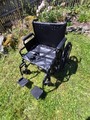 Wheel chair, wide seat, self propelled, new condition