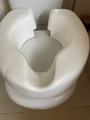 Raised toilet seat