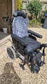 Invacare Rea Azalea Tilt In Space Transit wheelchair.