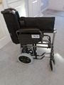 Push along black wheelchair  image