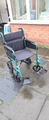 Attendant-propelled lightweight wheelchair in excellent working condition image