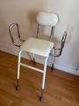 Chair with hand rails 