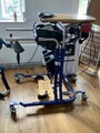 Quest 88 standing frame with electric retractable belt system