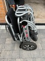 Folding powered wheelchair