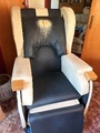 specialist seating tilt-in-space mobility chair featuring cream and black upholstery