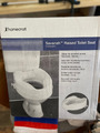 Raised toilet seat