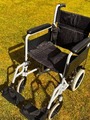 Lightweight travel wheelchair